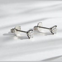 Load image into Gallery viewer, Silver Stud Earrings, CZ Sterling Silver, Mini Solitaire Earrings, Rhodium Coated Jewelry, High-Quality Cubic Zirconia, OLLUU Earrings, Non-Allergenic Jewelry, 925 Stamped Earrings, Authentic Silver Studs, Elegance and Sophistication, Timeless Jewelry Pieces, Women&#39;s Fashion Accessories, Luxurious Silver Earrings, Chic Studs, Designer Sterling Silver, Elegant Jewelry Collection, Premium CZ Earrings, Gift Ideas for Her, Rhodium Plated Silver, OLLUU Mini Studs,
