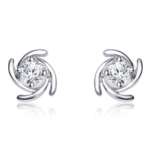 Load image into Gallery viewer, Sterling silver earrings, Cubic zirconia jewelry, Rhodium-coated earrings, Hypoallergenic jewelry, Flower-shaped earrings, Diamond stud earrings, Authentic 925 stamp, OLLUU jewelry, Women&#39;s fashion accessories, Statement earrings, High-quality CZ earrings, Silver jewelry, Fashion earrings, Rhodium-plated jewelry, Non-allergic earrings, Elegant jewelry, Premium stud earrings, Silver cubic zirconia earrings, Flower design earrings, 6-month warranty jewelry,